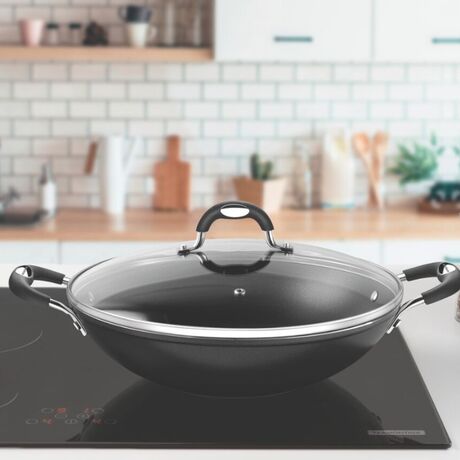 TRAMONTINA WOK Τηγάνι Monaco Induction Ø32 με Αντικολλητική επίστρωση Starflon Premium και Γυάλινο Καπάκι - 4.5lt Μαύρο